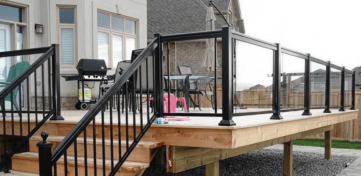 Handrail installation on a deck staircase for safety and code compliance in Naperville, IL